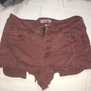 Distressed rust jean shorts